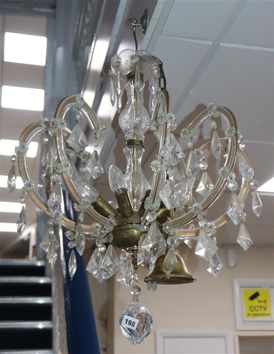 A cut glass eight branch chandelier, height 66cm